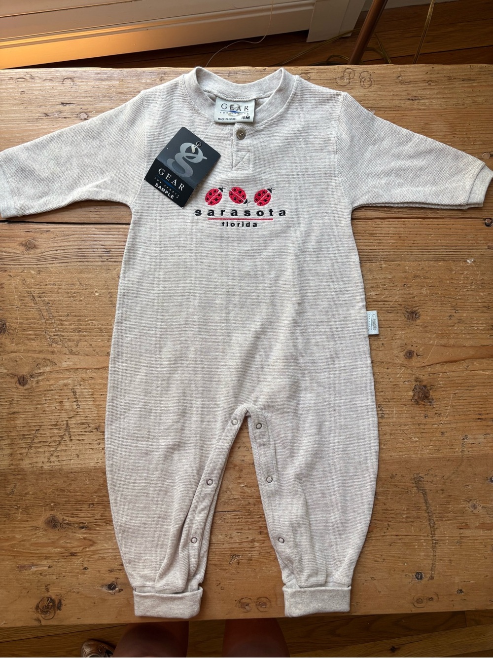 VTG Gear Baby Beige Sarasota One-Piece Footie with Ladybug Detail